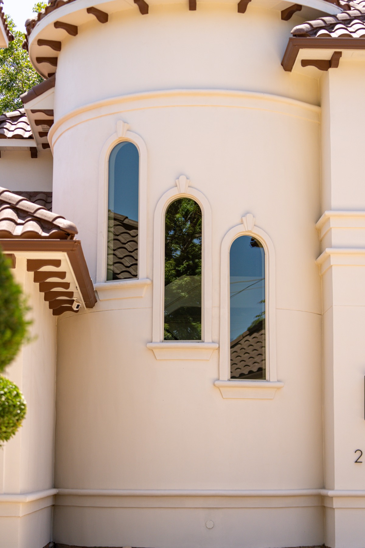 The arched turret windows, freshly cleaned.